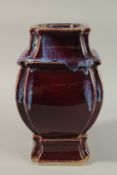 A LARGE CHINESE FLAMBE SQUARE-FORM PORCELAIN VASE, base with character mark, 33cm high.