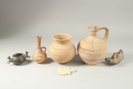 A COLLECTION OF THREE POTTERY PIECES, A SELJUK CENSER, & ROMAN LAMP, together with a marble carving,