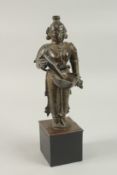 A FINE 17TH CENTURY SOUTH INDIAN BRONZE DEEPALAKSHMI OIL LAMP, mounted to a square base, the