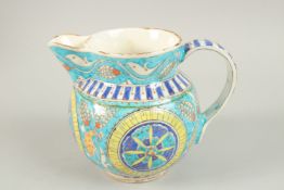 AN OTTOMAN TURKISH KUTAHYA GLAZED POTTERY JUG, 14.5cm high.