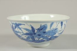 A FINE CHINESE BLUE AND WHITE PORCELAIN BOWL, the exterior painted with foliate decoration and