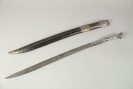 A FINE 18TH CENTURY OTTOMAN YATAGHAN SWORD WITH NIELLO INLAID SILVER HANDLE, signed and engraved