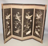A FINELY EMBROIDERED SILK AND WIRE FOUR-PANEL SCREEN, depicting various birds, each hinged panel