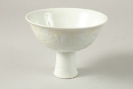 A CHINESE DEHUA WHITE GLAZE DRAGON STEM CUP, 14.5cm diameter.