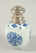 A CHINESE KANGXI BLUE AND WHITE PORCELAIN CADDY, with silver mounted lid, 19cm high.