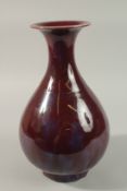 A LARGE CHINESE FLAMBE GLAZED PORCELAIN VASE, 35cm high.