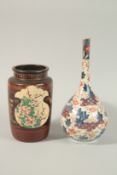 A JAPANESE IMARI PORCELAIN BOTTLE VASE, 25.5cm high, together with an unusual gilded red and black