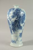 A VERY LARGE CHINESE BLUE AND WHITE PORCELAIN VASE, decorated with an expansive mountainous