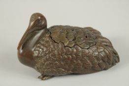 A BRONZE HERON LIDDED CENSER BURNER, 12cm long.