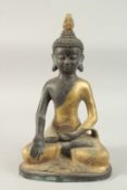 A BURMESE GILDED BRONZE SEATED BUDDHA, 39cm high, base 23cm wide.
