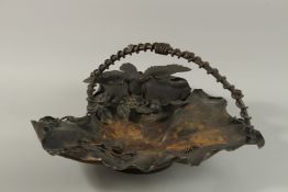 A JAPANESE METALWORK SCULPTURAL LEAF-FORM CENTREPIECE WITH MOUNTED OKIMONO OF A BIRD, with further