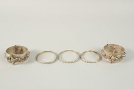 A COLLECTION OF FIVE OMANI BANGLES / BRACELETS, (5).