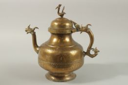 AN 18TH -19TH CENTURY MUGHAL INDIAN ENGRAVED BRASS EWER, with dragon shape handle and spout, peacock