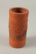 A CHINESE YIXING DRAGON BRUSH POT, 16cm high.