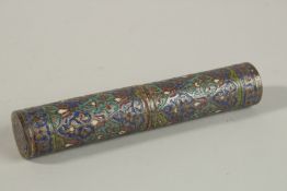 A 19TH CENTURY INDIAN KASHMIRI ENAMELLED GILT COPPER SCROLL HOLDER, 16cm long.