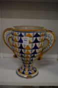A Cantigali pottery twin handled cup.