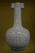 A large Chinese celadon crackle glazed bottle vase.