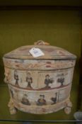 An unusual Chinese painted terracotta large circular bowl and cover.