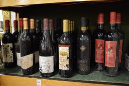 Quantity of assorted red wine.