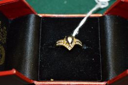 An 18ct gold, sapphire and diamond pear shaped ring, size N.