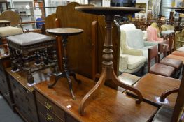Two mahogany tripod tables.