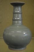 A Chinese celadon glazed bottle vase.