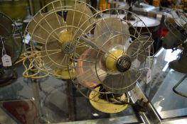 Two early Limit electric fans.