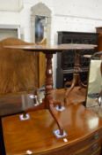 A good George III mahogany oval tilt-top tripod table.