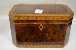 A good Georgian burr wood and inlaid two division tea caddy.