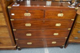 A good military style mahogany chest of two short and three graduated long drawers all with inset