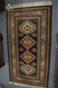 Small Persian style rug, 154cm x 84cm.
