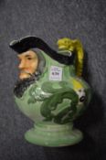 A Shorter pottery jug with a pirate spout.