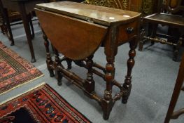 A good small 18th century oak drop-leaf gateleg dining table.