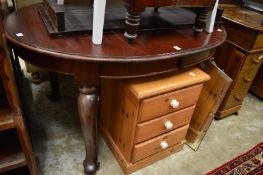 Mahogany dining table with one leaf.