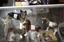 Porcelain model of an alsatian, a horse and a donkey.
