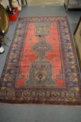 A Belouch rug, 211cm x 124cm.