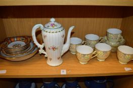 A Worcester coffee pot and other decorative china.