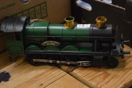 Tin plate model of a locomotive.