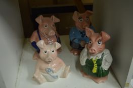 Four Wade piggy banks.