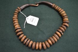 A horn bead necklace.