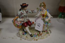 A Sitzendorf figure group of a young couple.