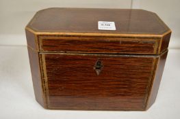 A partridge wood two division tea caddy.