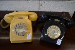 Two old telephones.