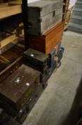 Military trunks and other storage items.