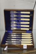 A cased set of six fish knives and forks.