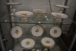 A floral and gilt decorated part dessert service.