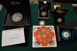 A quantity of boxed collectors coins.