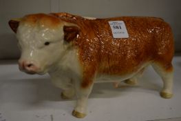 Porcelain model of a bull.