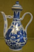 A Chinese blue and white ewer and cover.