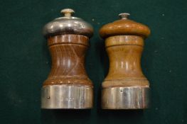 Two pepper mills.